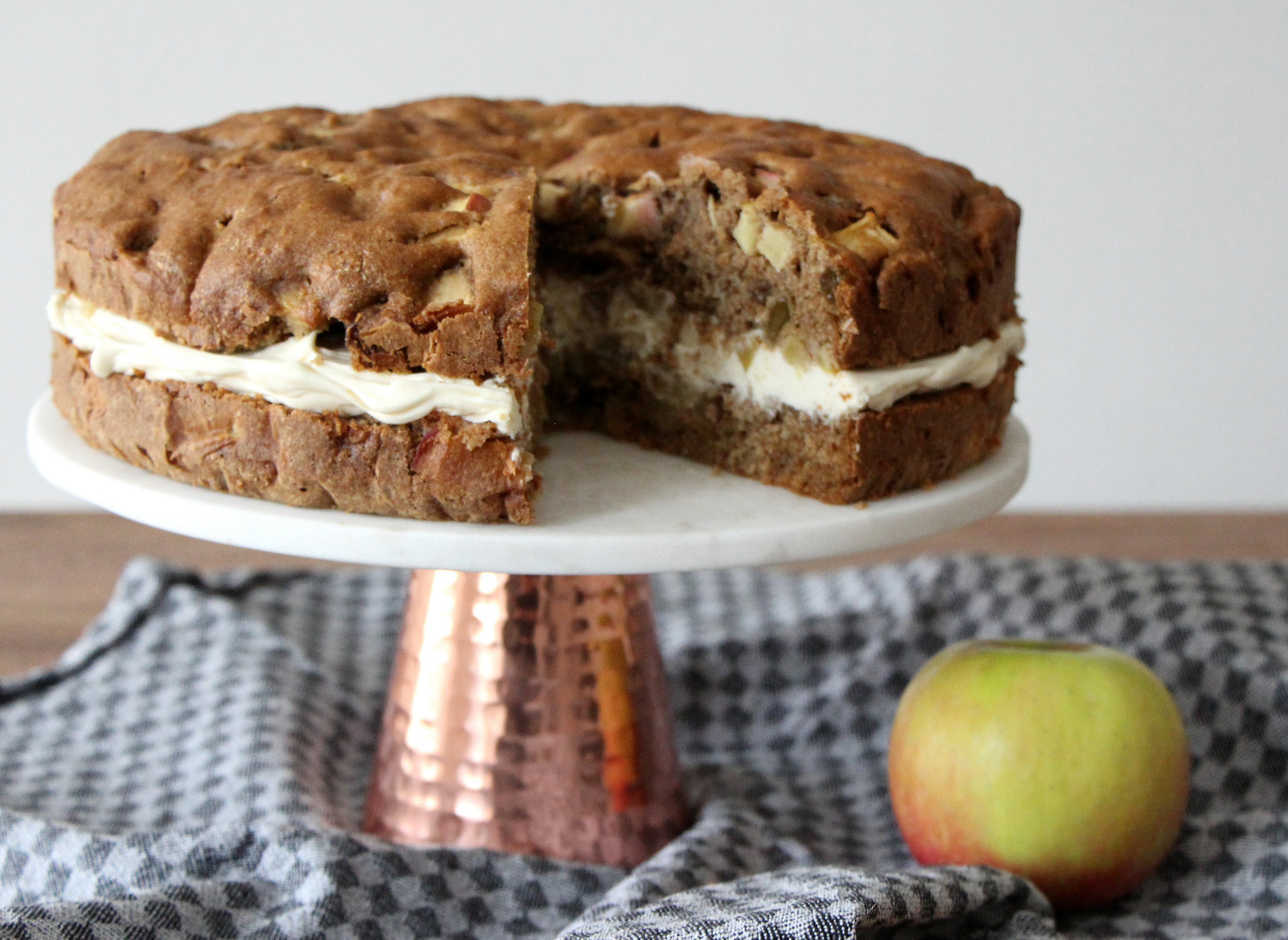 Whole grain apple cake with mascarpone icing